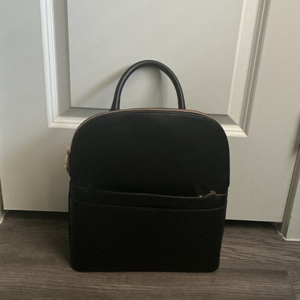 Minimalist Black Top-Handle Backpack with Gold Zipper